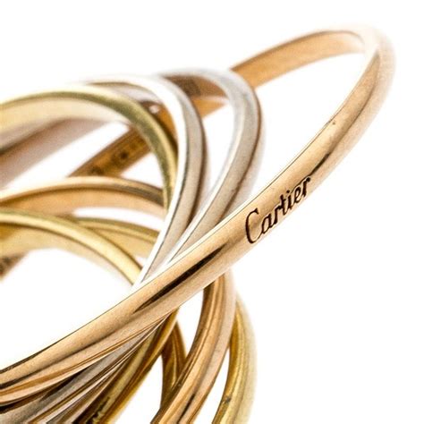 cartier 7 band rolling ring.